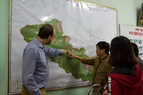 Pu Mat National Park staff point to one of the Ranger Stations within the park