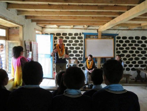 Josh presenting at a local school a part of the Roots and Shoots programme