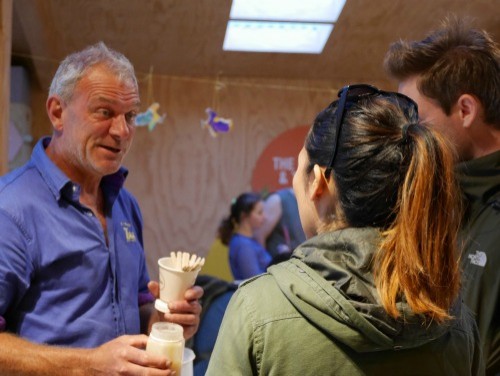 Zoo Staff member John Brien offering some honey taste testing with some of our visitors