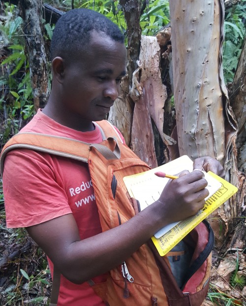 Local guide, Jean Honere recording data